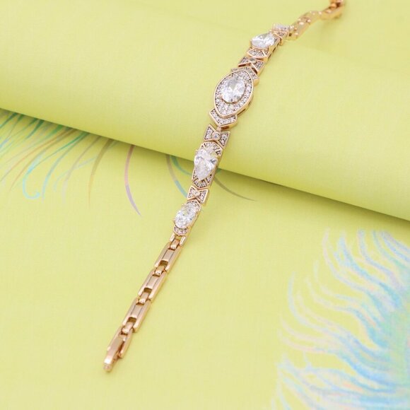 "Elegant Oval-Cut Crystal Rose Gold Bracelet with Bow Accents, XPBL0800 - Picture 6 of 11